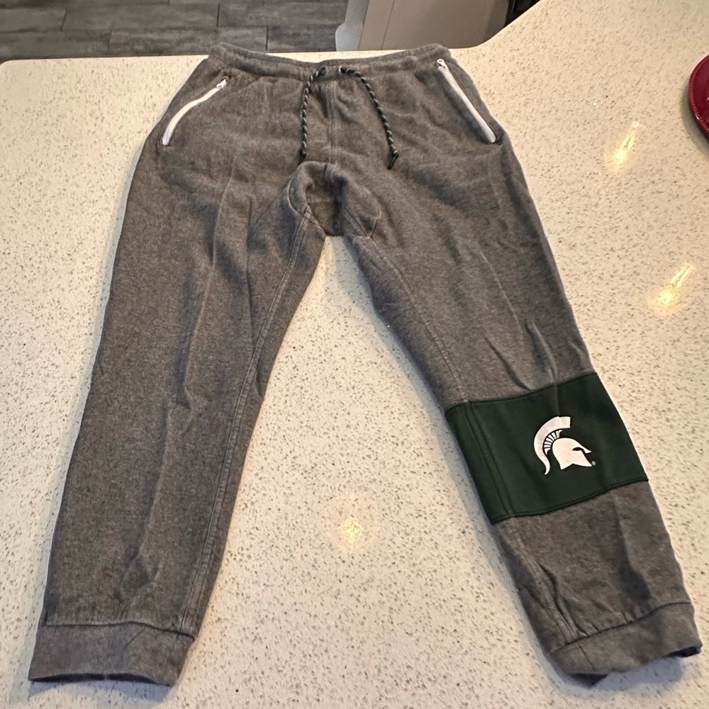 Gray Joggers With Green Logo Patch - image 1